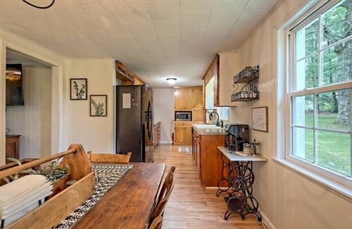 Scaly Mountain House | Escape to nature with this pet-friendly, family retreat just 15 minutes from Highlands! Perfect for hiking, relaxing, and playtime with the kids. Utilize the outdoor fire pit, indoor fireplace and the playhouse in the side yard full of games!