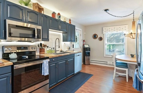 Wolcott House | Escape to our cozy 2-BR lakefront cottage on East Bay! Sleeps 6.