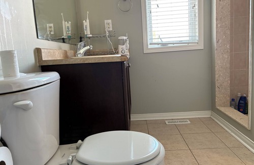 Pickering House | Escape to our cozy master ensuite, East Pickering, in charming home. Wifi and AC
