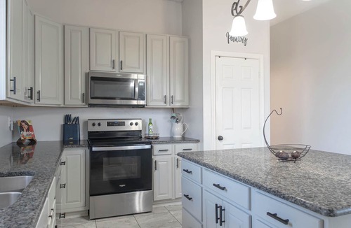 Southwest Arlington House | Escape to our spacious modern home in the Dallas-Fort Worth area! Perfect for families and friends, it features multiple living areas, a full kitchen, private backyard, and easy access to Arlington, Dallas, and Fort Worth attractions.