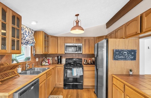 Fishers Hill House | Escape To This River Home with Mountain Views by RedAwning