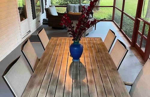 Cambridge House | Escape with family or friends to this peaceful, 4-bedroom retreat on the water
