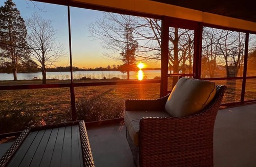 Cambridge House | Escape with family or friends to this peaceful, 4-bedroom retreat on the water