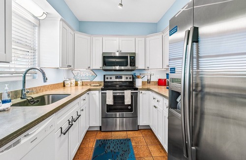 City-by-the Sea House | Estes Oasis 4 Bedroom Home by RedAwning