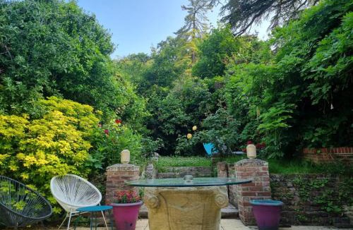 Saint-Prix House | Evasion Romantique suite de luxe jacuzzi jardin privé proche Paris