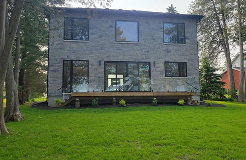 Stone Mills House | Evening Glory on the Lake: Luxury Getaway