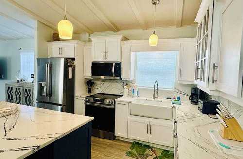Anna Maria House | Everything inside is new and beachy! 2 blocks to Bean Point Beach! PETS ALLOWED