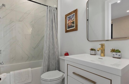 Stone Harbor House | EXCEPTIONAL LUXURY, CUSTOM, NEW CONSTRUCTION BAY FRONT HOME WITH POOL AND 3-STOP ELEVATOR.