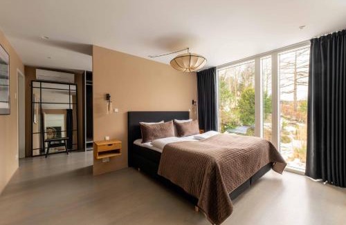Charlottenlund Apartment | Exclusive Duplex Mansion with Sauna & Pool