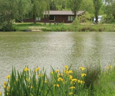 Laneuville-a-Remy Ski Chalet | Exclusive Lodge overlooking private lake