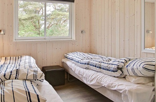 Ho House | Exclusive pool house u. a. with activity room, oven and Wi-Fi in Blåvand