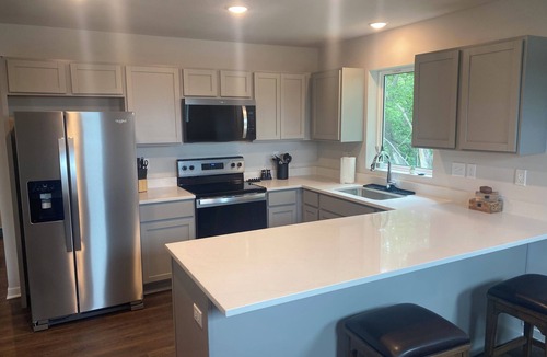 Atchison Apartment | Executive Penthouse Apartment the perfect place to call home!