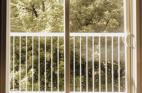 Elk Rapids Apartment | Executive Suite - 1 King | Sleeper Sofa | Balcony