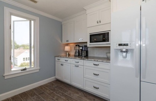 Falmouth House | Expansive deck with ocean views