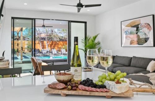 East MLK House | Expansive Luxury Duplex with Shared Pool