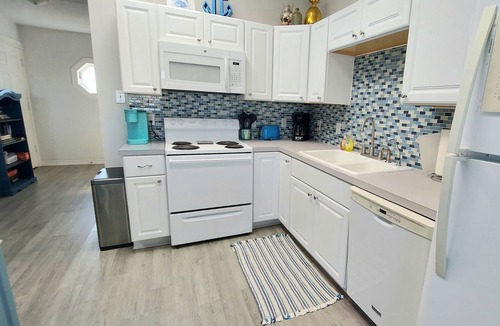 Surfside Beach House | Expansive ocean views from double decks, just steps to beach