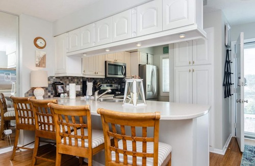 Kure Beach Condo | Expansive views from top floor Ocean Dunes condo!