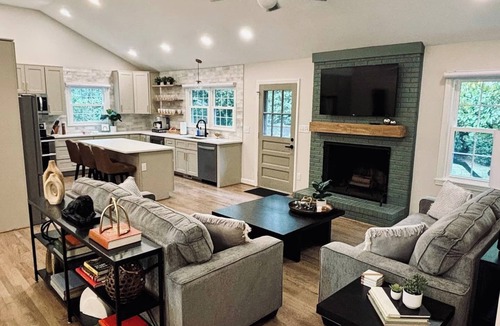 Northwest Raleigh House | Experience an elevated group getaway in this renovated 3,100 sqft, 5-bdrm 3 bth. Perfect for families, it features a massive 900 sqft game room with a pool ping pong table, wet bar, & much more. Enjoy a luxurious stay with hotel-style amenities.