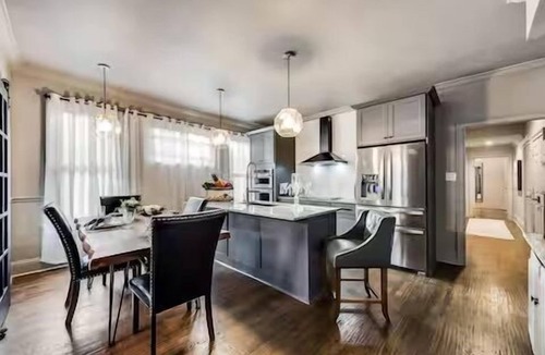 Old East Dallas Condo | Experience Dallas luxury redefined in this one-of-a-kind, three-bedroom residence, where historic charm meets cutting-edge comfort. Thoughtfully curated for discerning travelers, every detail has been elevated for a great getaway. A great short stay!