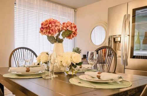 Old East Dallas Condo | Experience elevated living in this executive 2-bed, 1.5-bath furnished condo featuring a private garden-view patio. Enjoy resort-style amenities including a pool, sauna, cold plunge, and outdoor fitness deck. Perfect for extended stays!