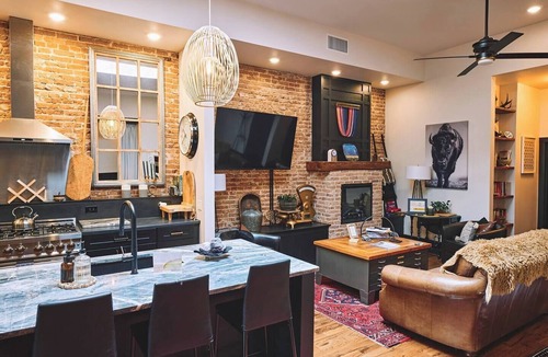 Sheridan Apartment | Experience historic downtown Sheridan from our luxurious 2-bed, 2-bath loft in an 1892 building.