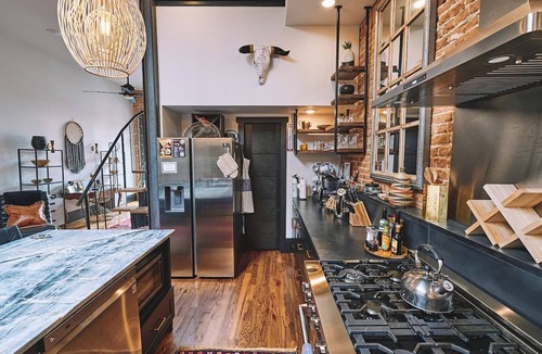 Sheridan Apartment | Experience historic downtown Sheridan from our luxurious 2-bed, 2-bath loft in an 1892 building.