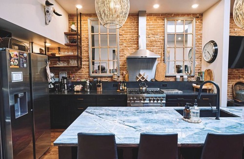 Sheridan Apartment | Experience historic downtown Sheridan from our luxurious 2-bed, 2-bath loft in an 1892 building.