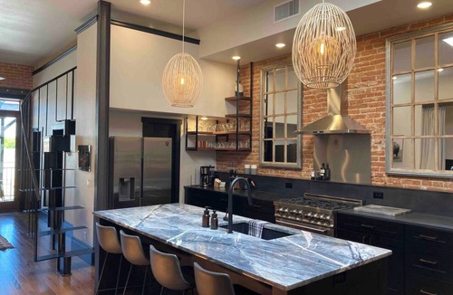 Sheridan Apartment | Experience historic downtown Sheridan from our luxurious 2-bed, 2-bath loft in an 1892 building.