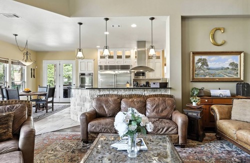 Rocky Ridge House | Experience luxury on Lake Travis! Enjoy stunning lake views, a private pool, spa, fire pit, and plenty of space for the whole crew. This gated retreat sleeps 17+ and features a chef’s kitchen, bar, media room, game room, dedicated office, playscape,