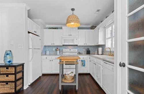 Tranquil Harbour House | Experience Oak Island at 'Playin Hooky': a cozy 3BR retreat with private pool.