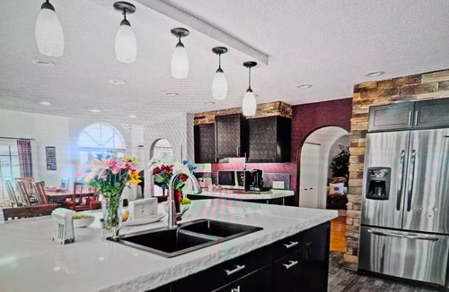 Scottsbluff House | Experience Scottsbluff charm in our spacious 4-bedroom retreat