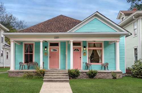 East of Broadway Apartment | Experience the Historic Armstrong Cottage in the Sunshine Suite