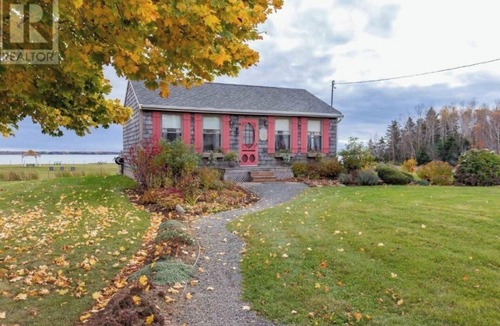 Kings County Cottage | Experience tranquility by the sea, Magnificent views, Romantic charm.