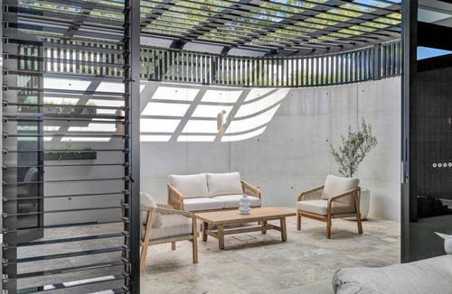 Tallai Apartment | Experience unparalleled luxury at this modern architectural masterpiece.