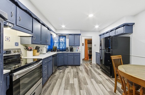 Wichita House | Experience Wichita living near WSU! Fire Pit, Pool Table, and Arcade games.