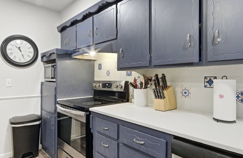 Wichita House | Experience Wichita living near WSU! Fire Pit, Pool Table, and Arcade games.