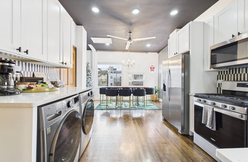 Wrigleyville House | Expertly designed 9BR Art Deco manor with garage.