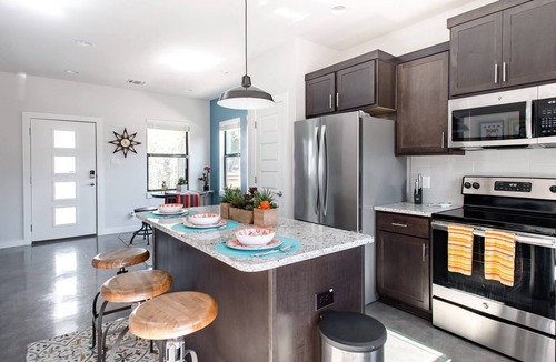 Eastside Promise Neighborhood House | Explore the River Walk from Artsy Designer Retro Chic Home