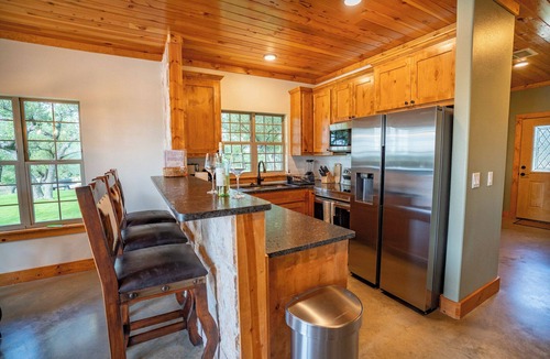 Lampasas Cottage | Exquisite Hill Country Cottage-Giraffe experiences, millions of bluebonnets now!
