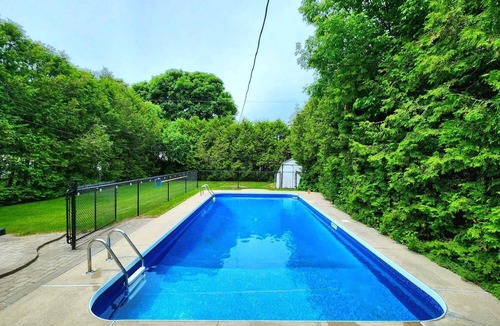 Amherstview House | Exquisite summer retreat with heated pool