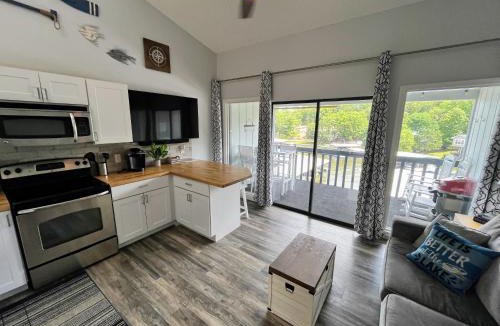 Osage Beach Apartment | F Lakefront! Remodeled, Sleeps 4, Boat Slip, Patio, WiFi, Cable, Pool