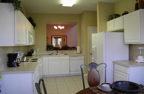 Windsor Hills House | Fabulous Lake View/South Facing Pool Home- Game room -2 Miles to Disney!