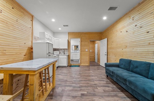 Cedar Lane Cabin | Family and pet friendly creek access with RV Hook up.