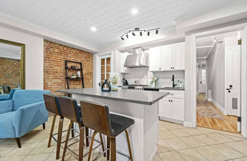 Central Park North Villa | Family Brownstone with Private Backyard Near Subway