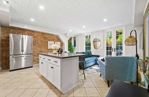 Central Park North Villa | Family Brownstone with Private Backyard Near Subway