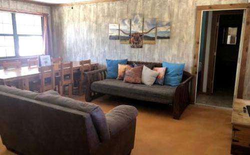 Paluxy House | Family Cabin Getaway with an Outdoor Fireplace near Lake Granbury in Texas