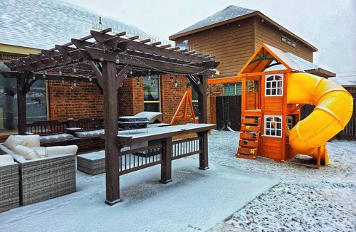 Midland House | Family Fortress – Huge 4BR Retreat Game Room, Fire Pit, Playground & Fenced Yard