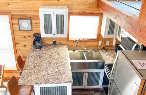 Seven Points RV Rental | Family-friendly cabin with EPIC amenities, pool, movie theatre, events & MORE!