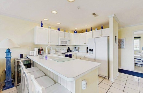 Heron Harbour Isle Condo | Family-friendly condo with beach access, pools, covered deck, W/D & AC
