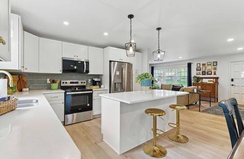 Overland Park House | Family-Friendly FiFA Base Camp w/Game Room, Patio, & Firepit